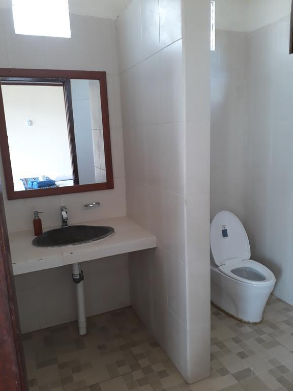 Kuta Bay Homestay Pokoj fotografie