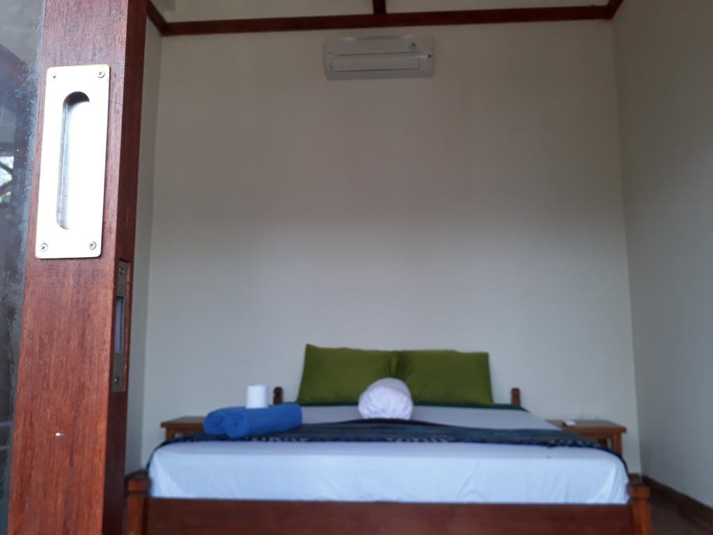 Kuta Bay Homestay Pokoj fotografie